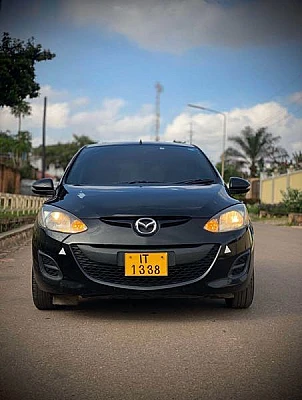 Toyota Corolla mazda damio