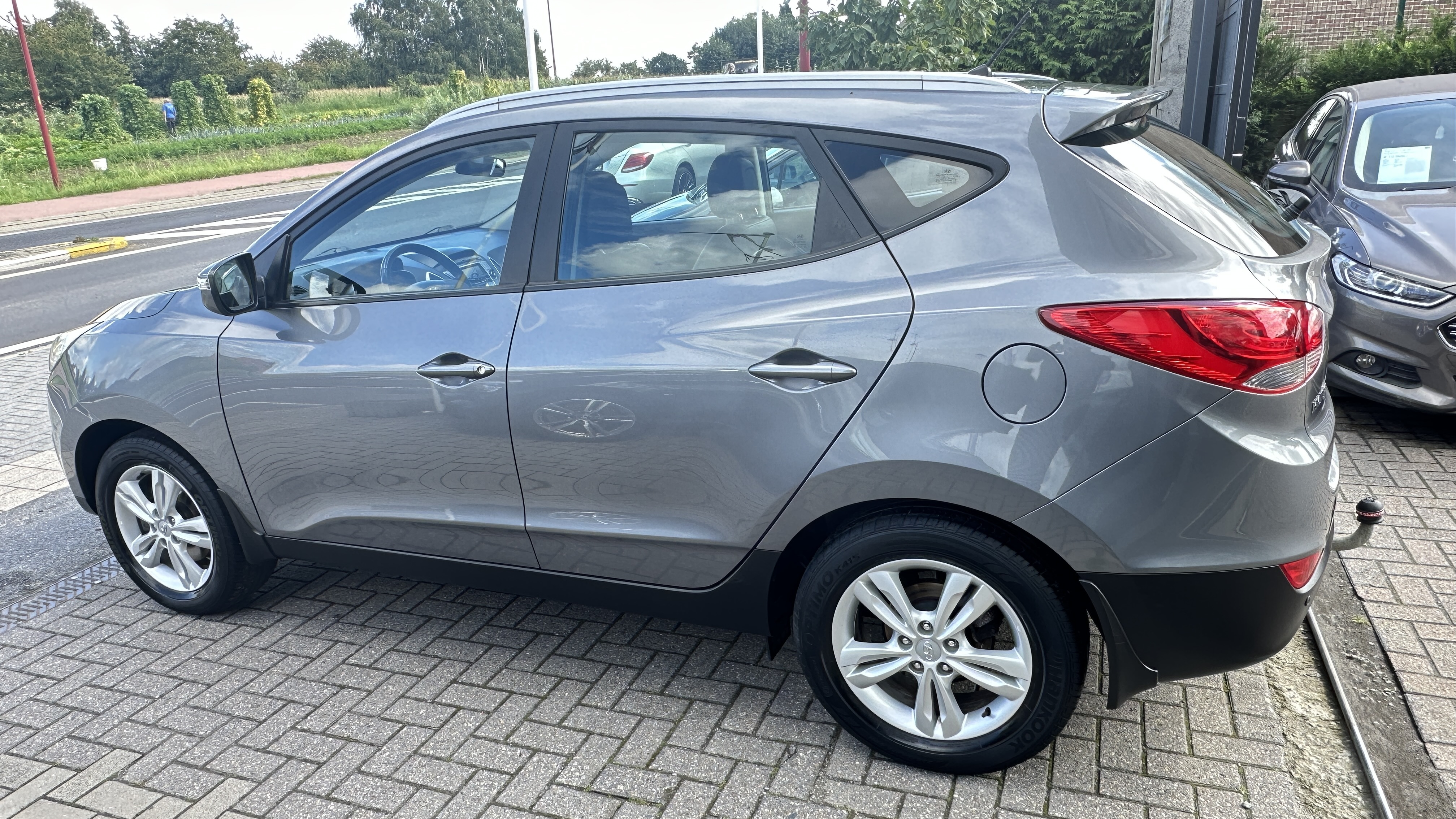 Hyundai Tucson IX35 1.6i 2WD Executive, Airco, Garantie 12 Mois.
