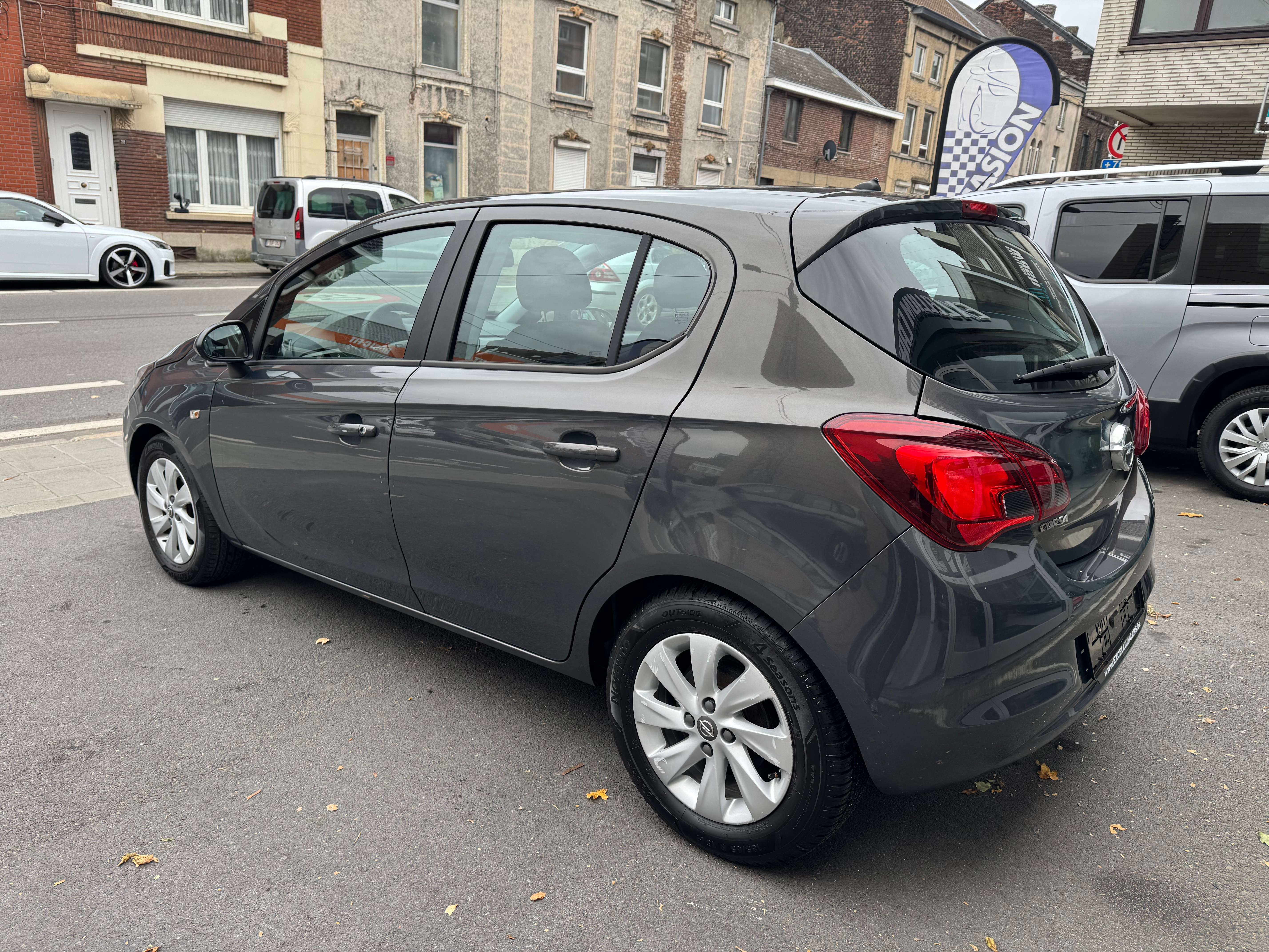 Opel Corsa 1.2i Gris Nardo 5porte Jante Airco Vitres Elect Tres Propre Er6B Carnet Garantie 1 ans