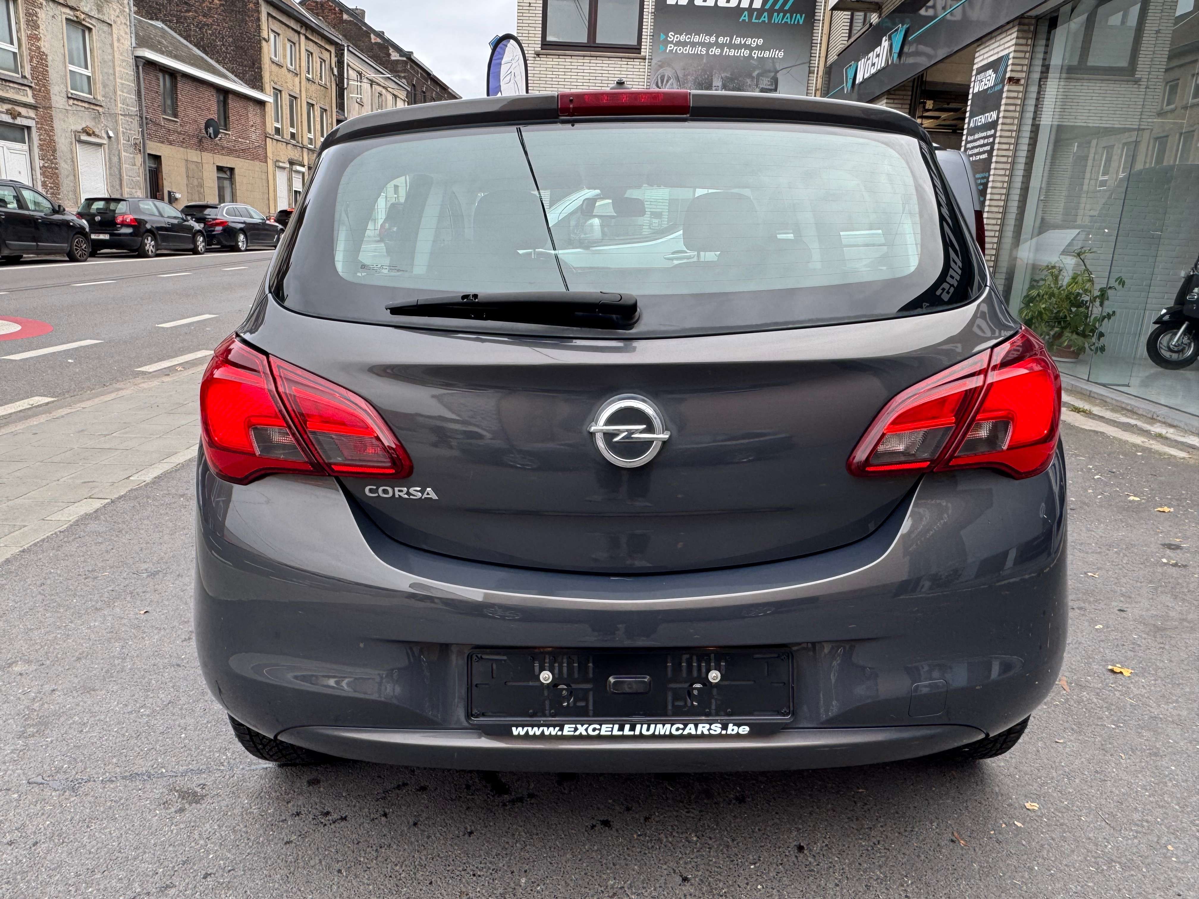 Opel Corsa 1.2i Gris Nardo 5porte Jante Airco Vitres Elect Tres Propre Er6B Carnet Garantie 1 ans