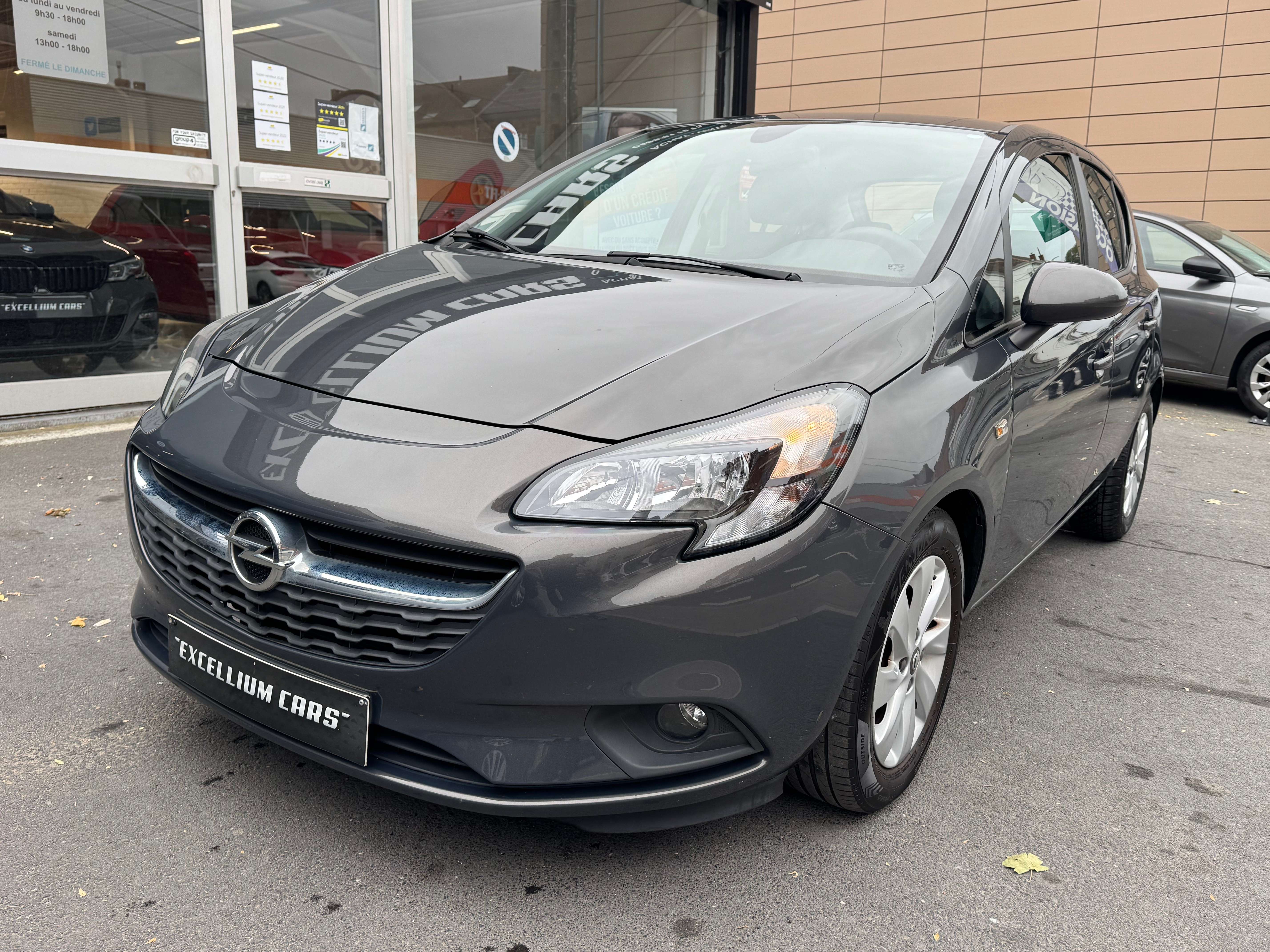 Opel Corsa 1.2i Gris Nardo 5porte Jante Airco Vitres Elect Tres Propre Er6B Carnet Garantie 1 ans