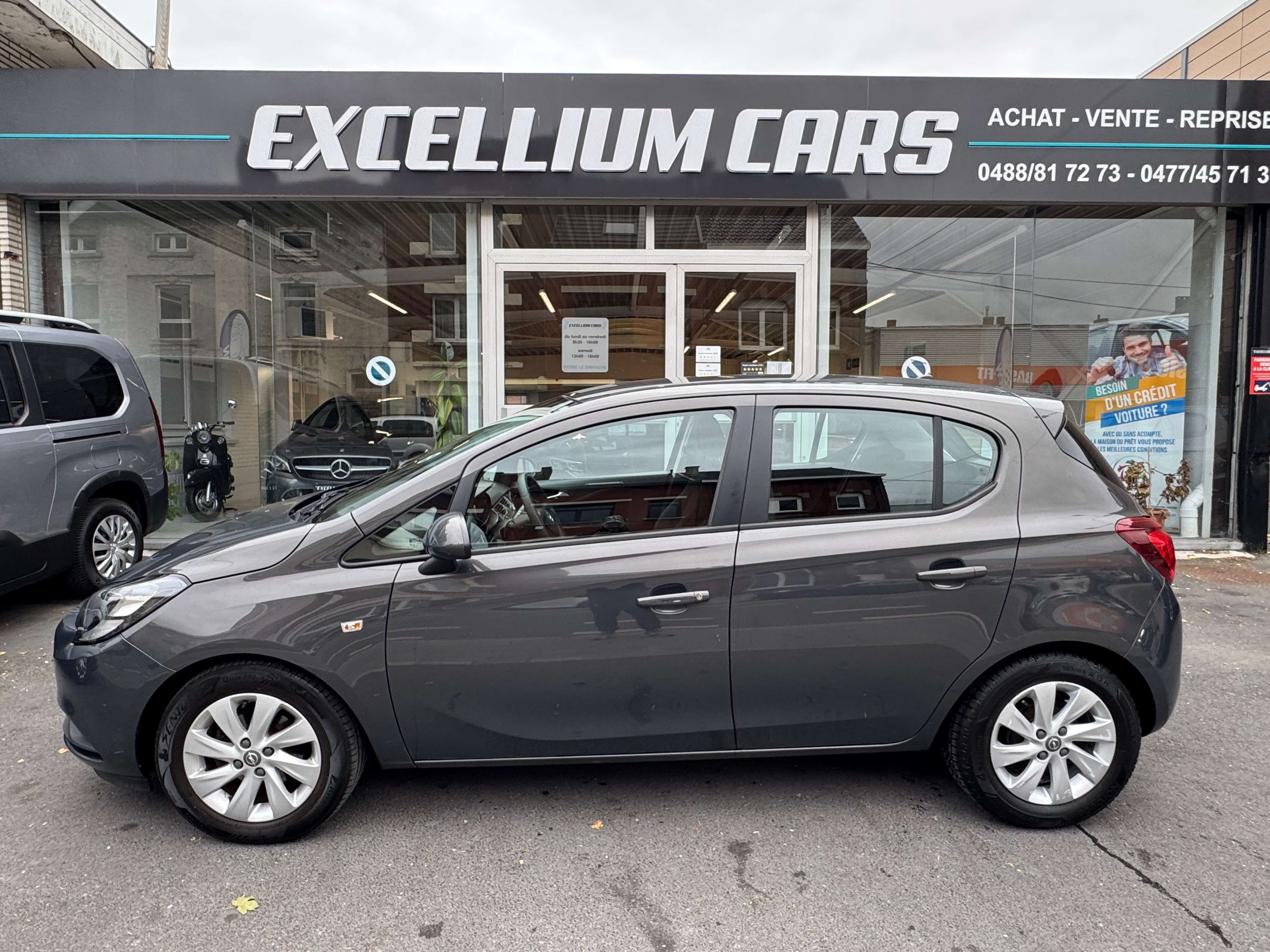 Opel Corsa 1.2i Gris Nardo 5porte Jante Airco Vitres Elect Tres Propre Er6B Carnet Garantie 1 ans