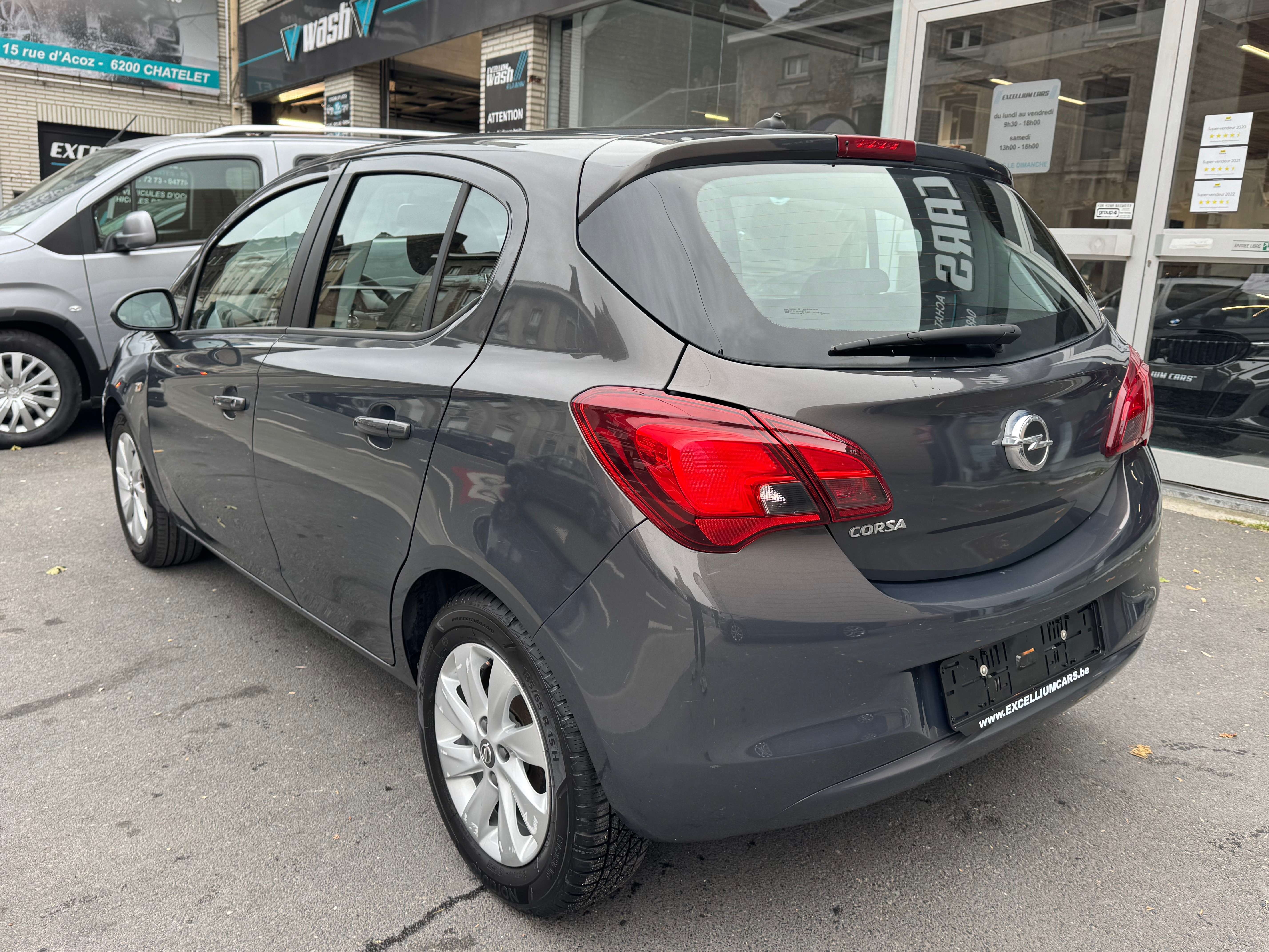 Opel Corsa 1.2i Gris Nardo 5porte Jante Airco Vitres Elect Tres Propre Er6B Carnet Garantie 1 ans