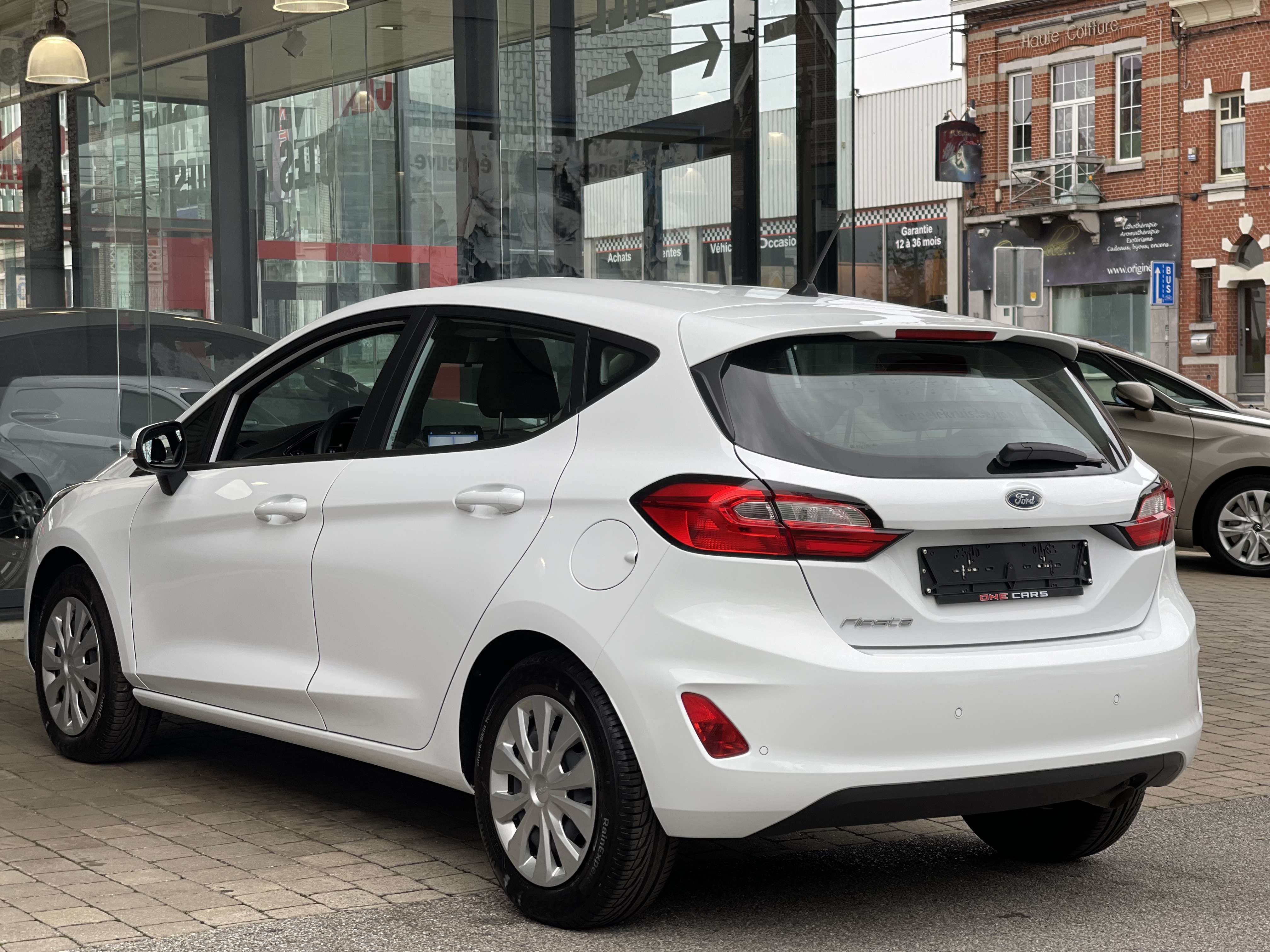 Ford Fiesta 1.1i (55kw 75cv) BIXENON-AIRCO-PARCTRONIC-GAR 1AN