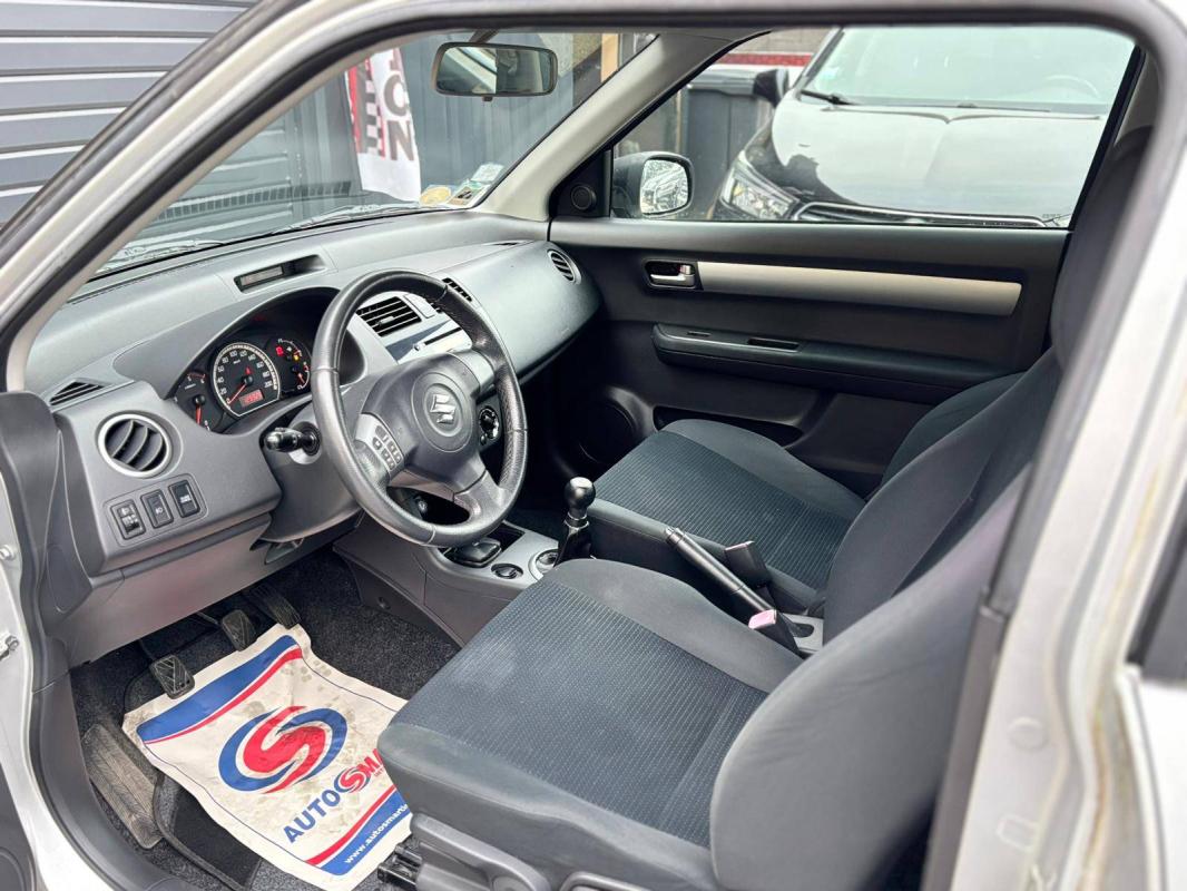 Suzuki Swift II 1.3 DDiS 75ch in the city 3p