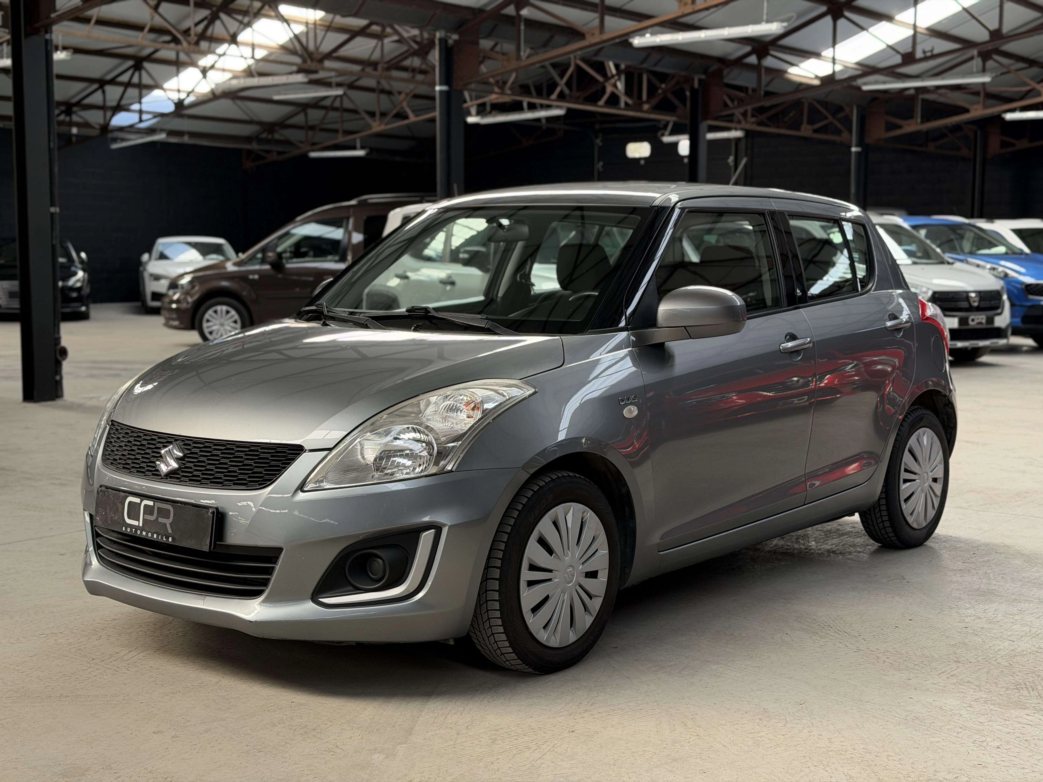 Suzuki Swift 1.3 D * GARANTIE 12 MOIS * CLIM * RADIO * USB