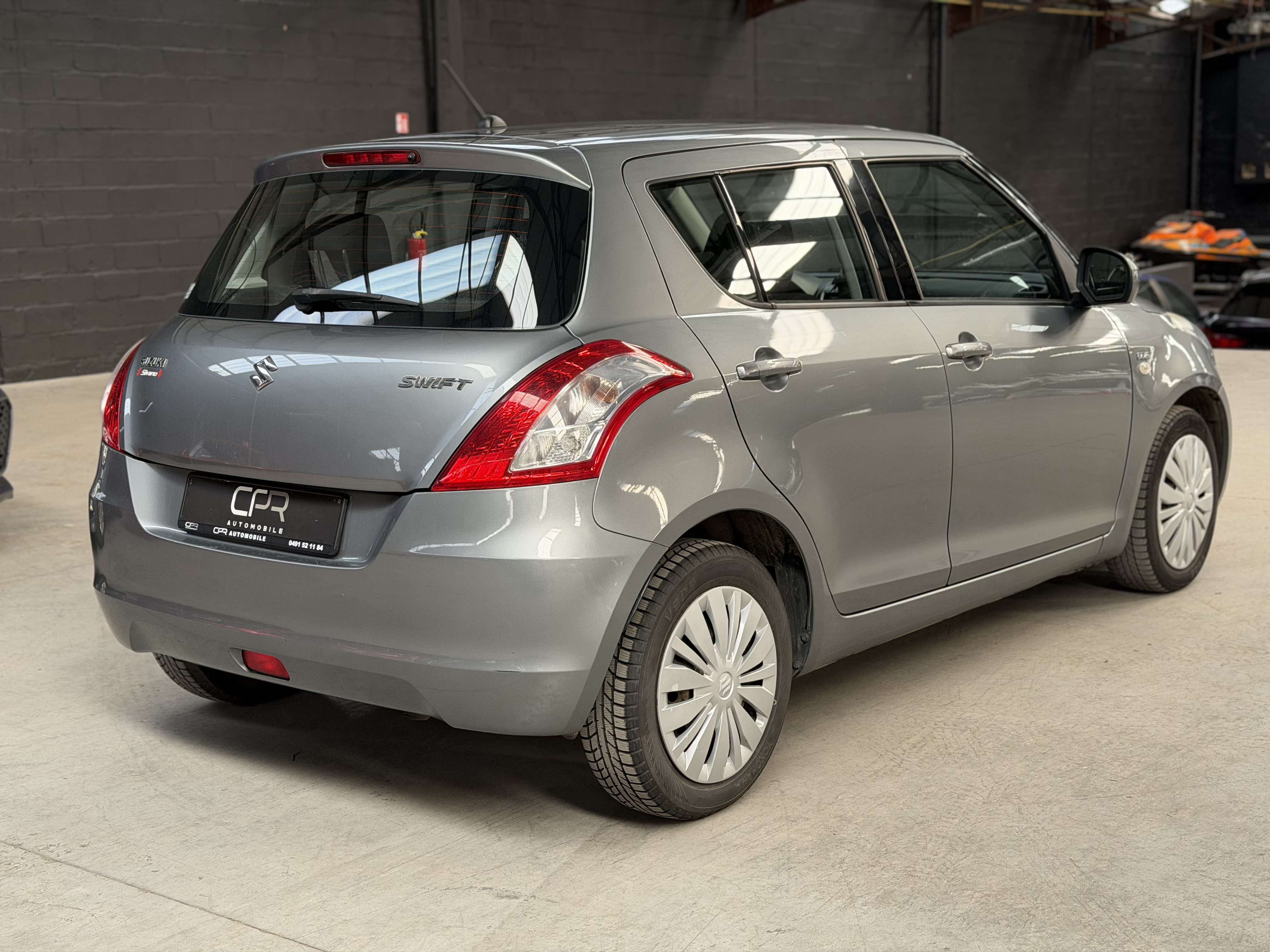 Suzuki Swift 1.3 D * GARANTIE 12 MOIS * CLIM * RADIO * USB