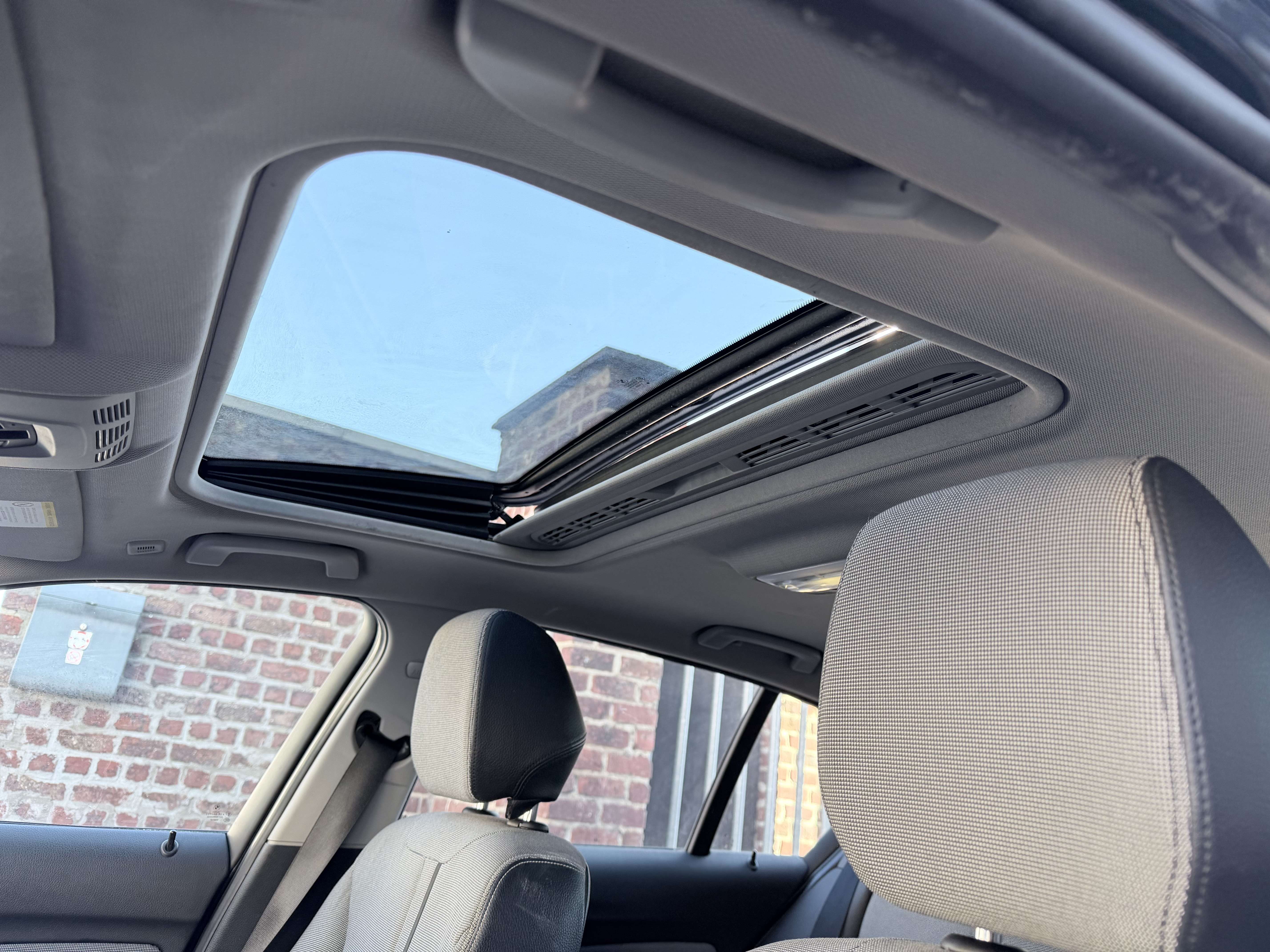 BMW 118 OPEN DAK | AUTOMAAT | NAVI | ZETEL VERWARMING