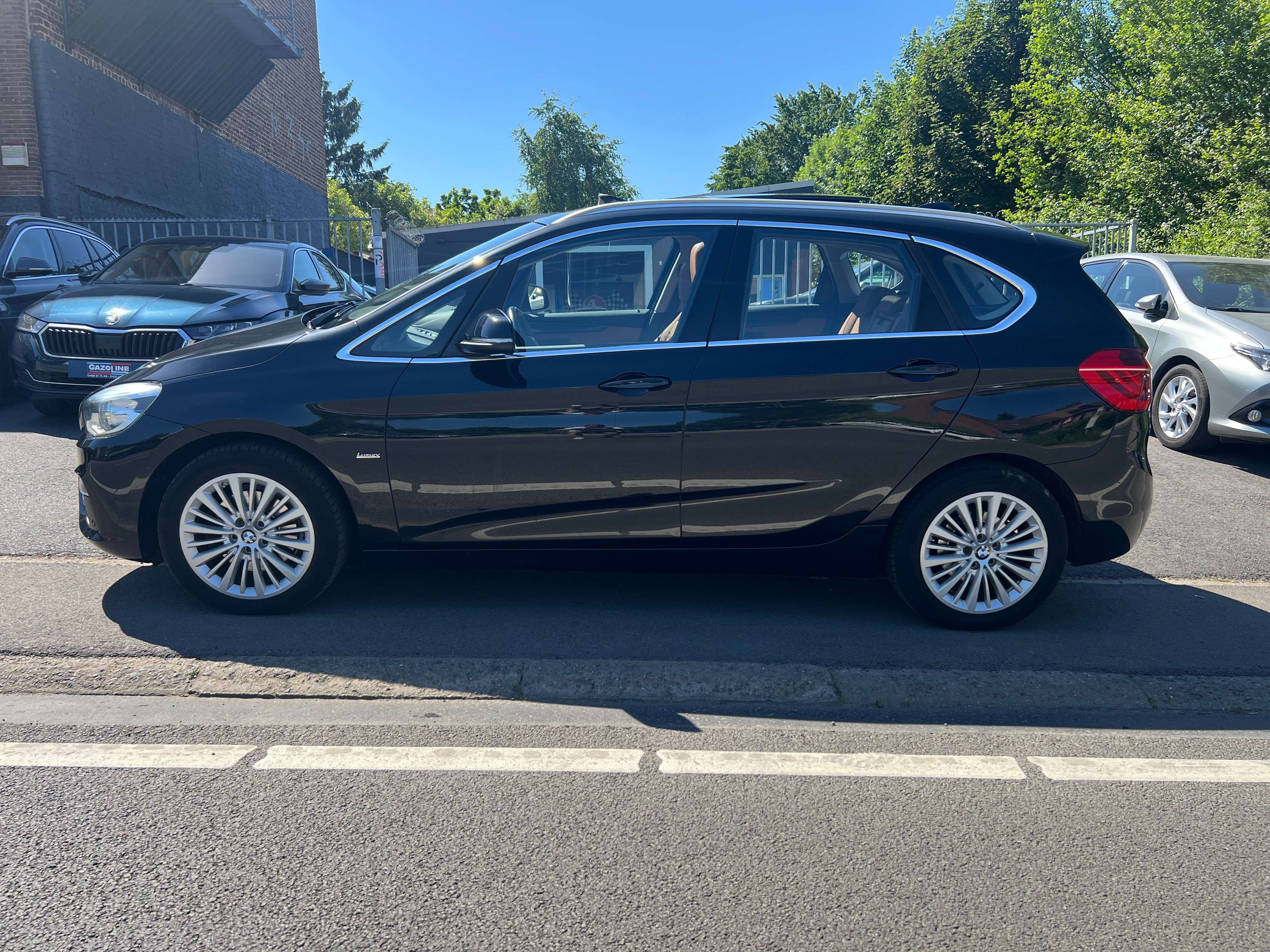 BMW 218 Active Tourer 218iA AUTOMATIQUE FULL OPTIONS CUIR GPS TOIT OUVRANT PANO 82.000Kms GARANTIE CRÉDIT 100%