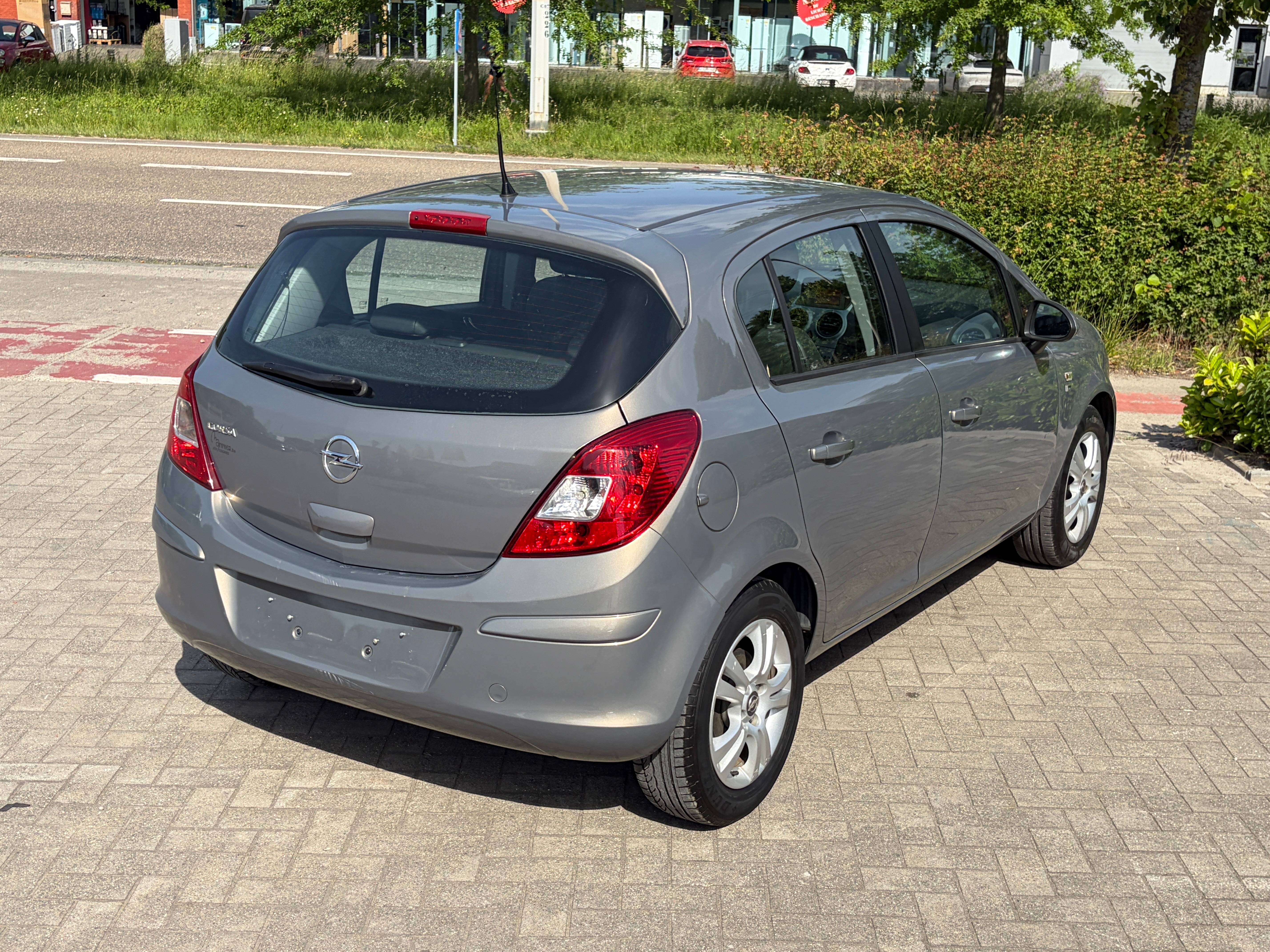 Opel Corsa 1.2i 5-drs **slechts 50.000km** Airco, Alu velgen, 1j garantie