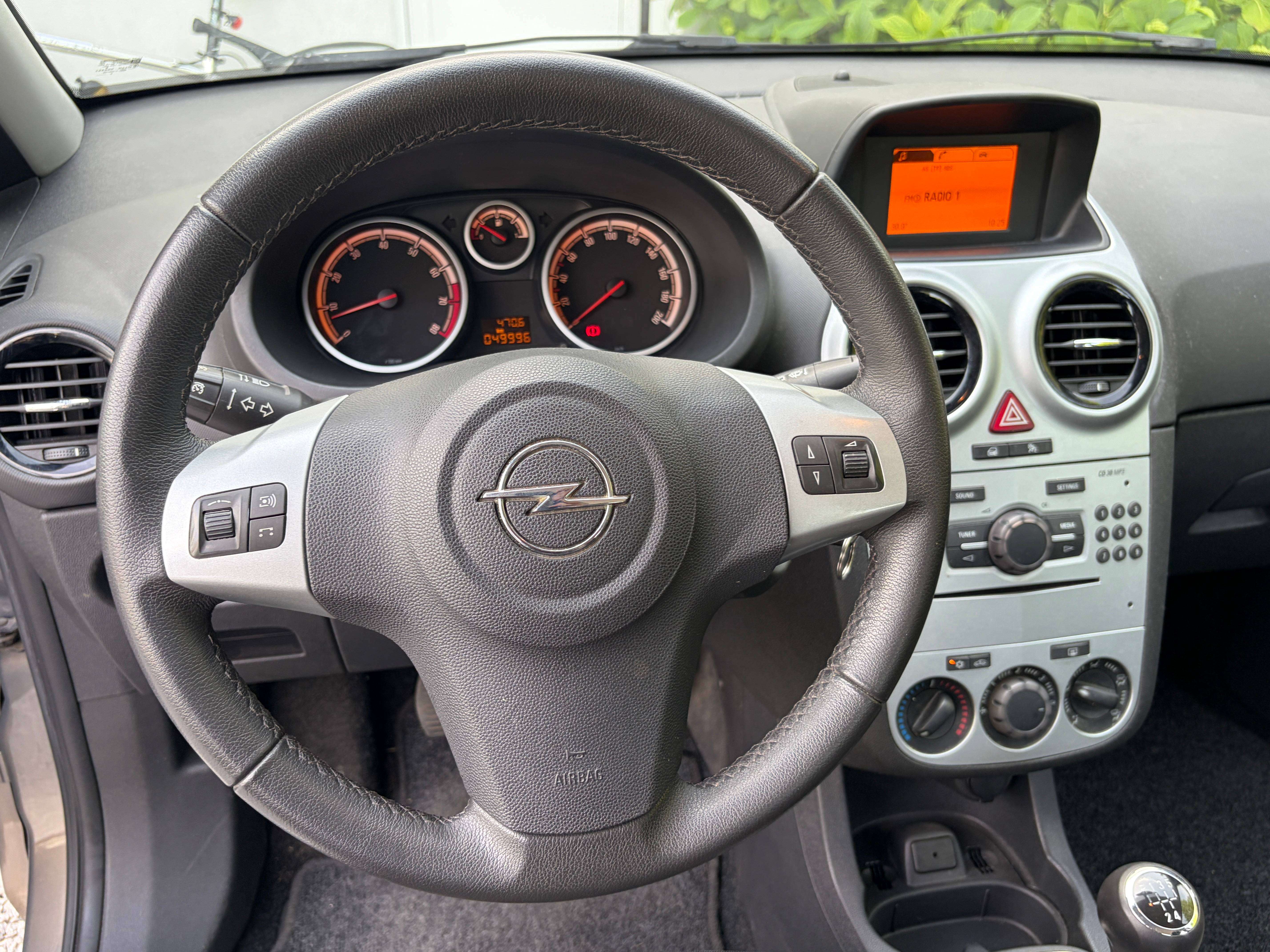 Opel Corsa 1.2i 5-drs **slechts 50.000km** Airco, Alu velgen, 1j garantie