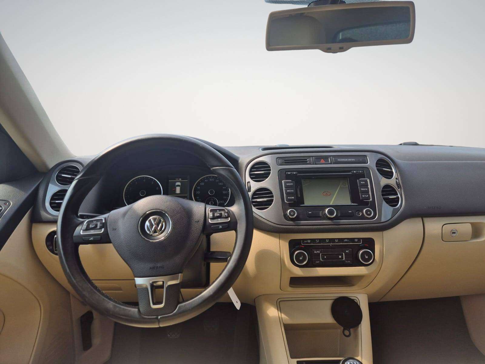 Volkswagen Tiguan 1.4 TSI Trend & Fun / 54.123 Km ! / Navigation / Full Capteurs / Garantie 12 Mois