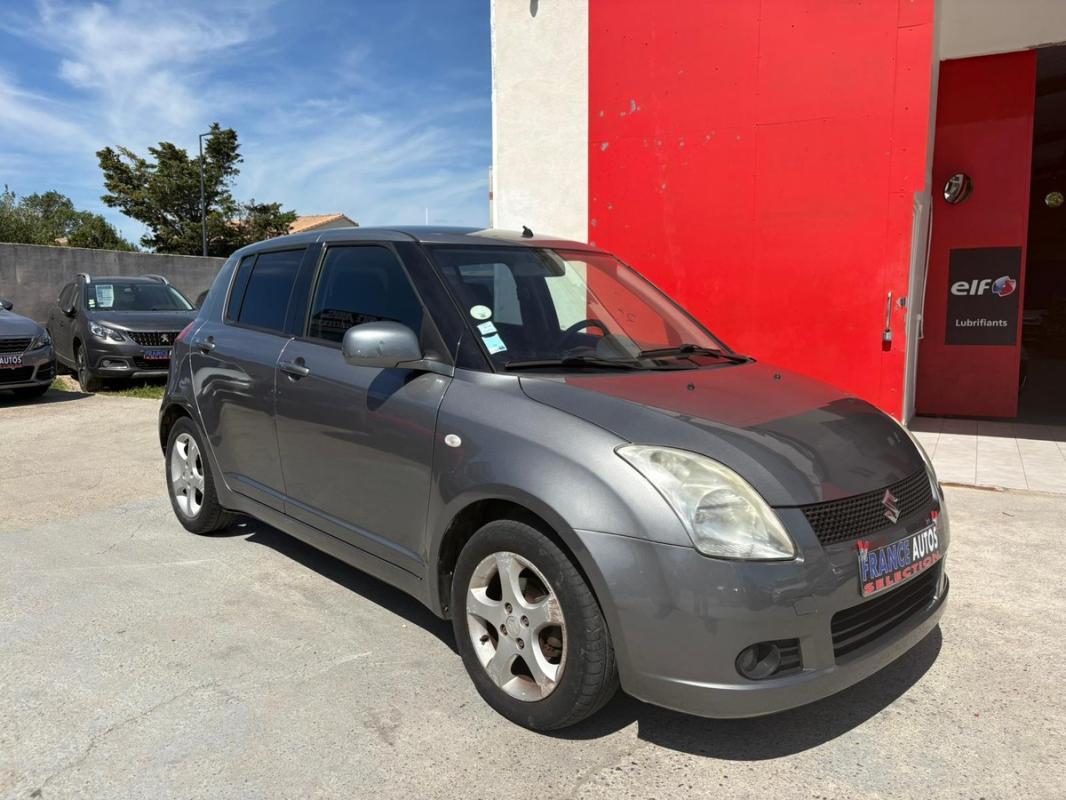 Suzuki Swift 1.3i 92 CH | ENTIÈREMENT RÉVISÉE ET GARANTIE 12 MOIS EN EUROPE