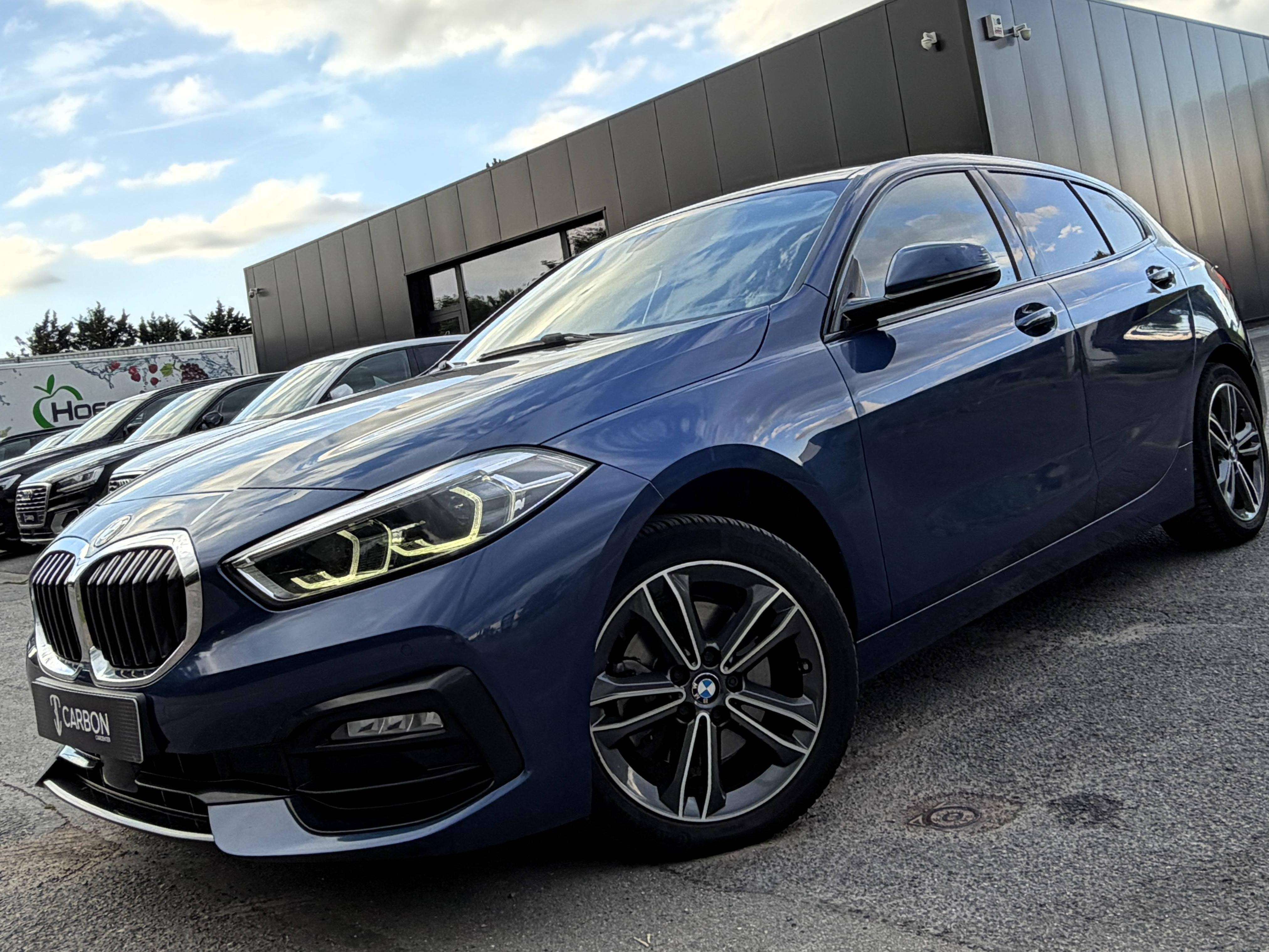 BMW 118 iA Sport Line 1er PROPRIO/COCKPIT/NAVI/CARPLAY/SHADOW LINE/SIEGES SPORT CHAUFF./HISTORIQUE COMPLET
