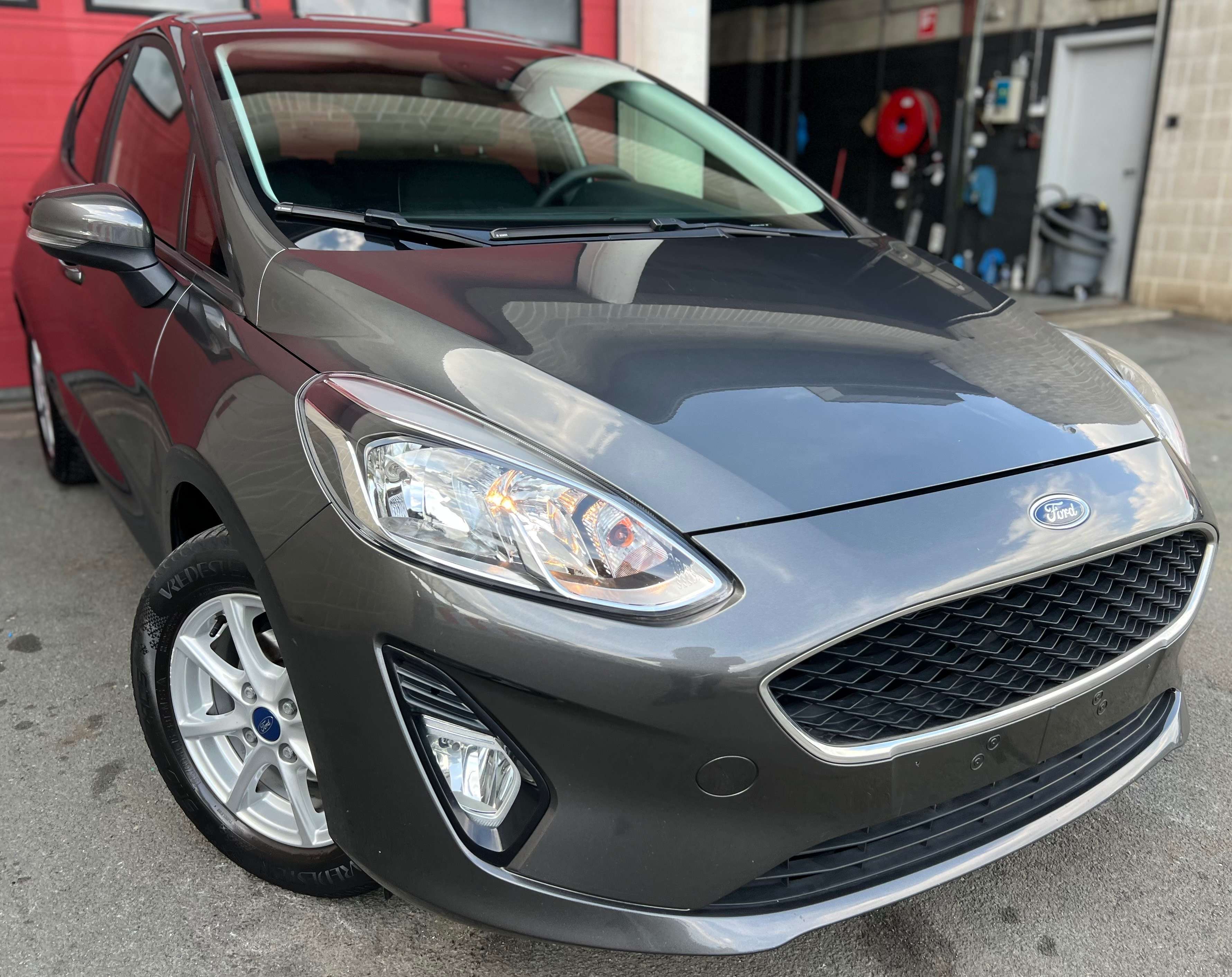 Ford Fiesta 1.1i Titanium + CAR-PASS + CLIM