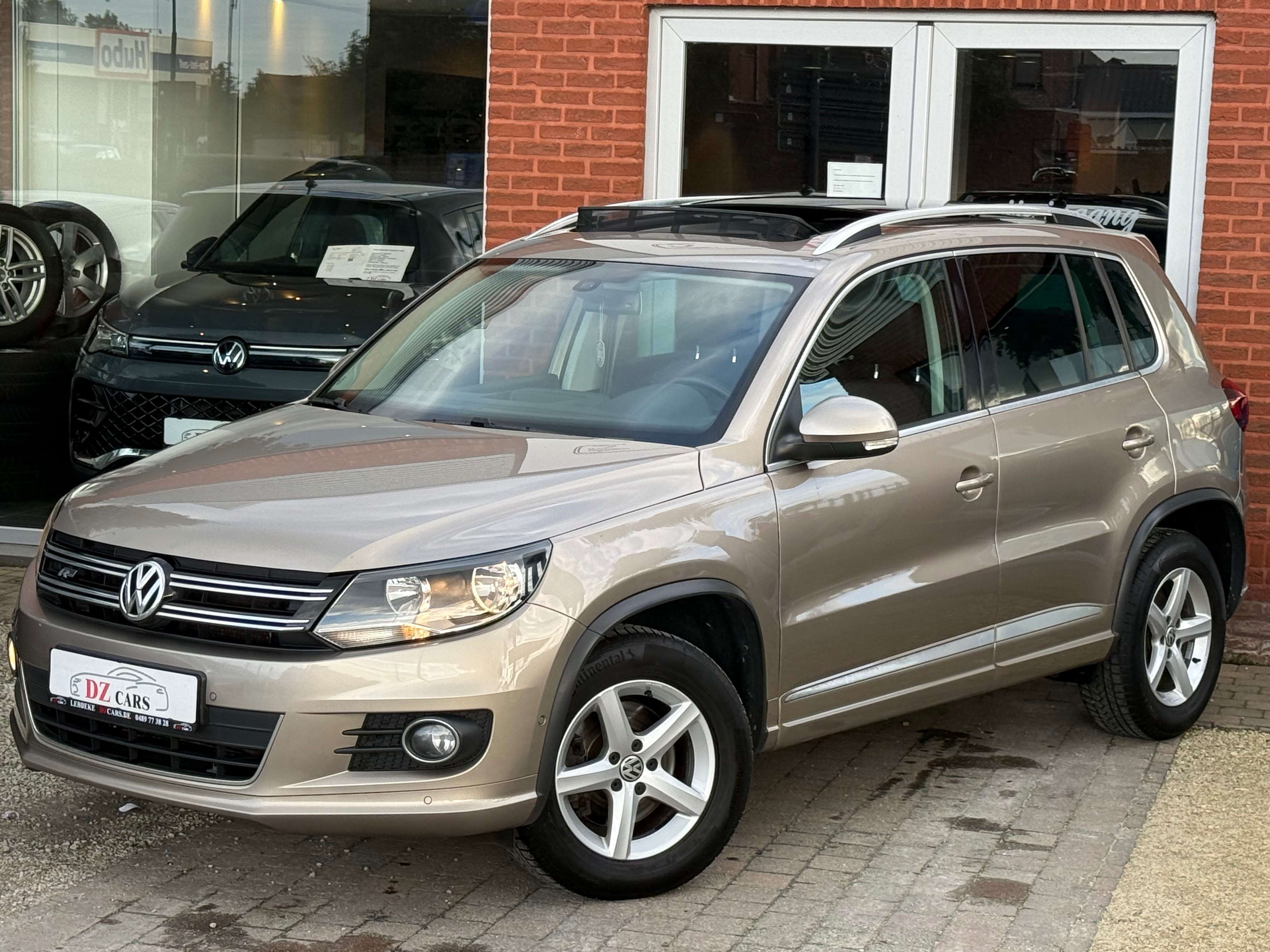 Volkswagen Tiguan R-LINE 1.4TSI 150PK DSG |✅NAVIGATIE | PANO DAK | LEDER | BLUETOOTH | TREKHAAK | ZETELVERWARMING |