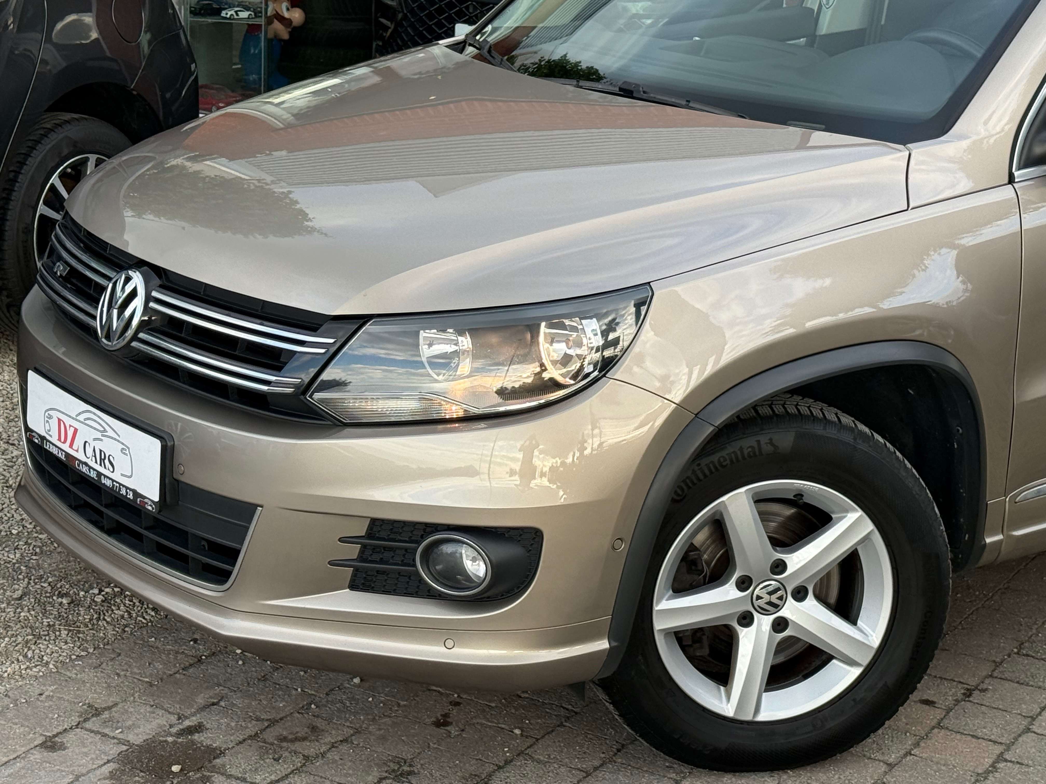 Volkswagen Tiguan R-LINE 1.4TSI 150PK DSG |✅NAVIGATIE | PANO DAK | LEDER | BLUETOOTH | TREKHAAK | ZETELVERWARMING |