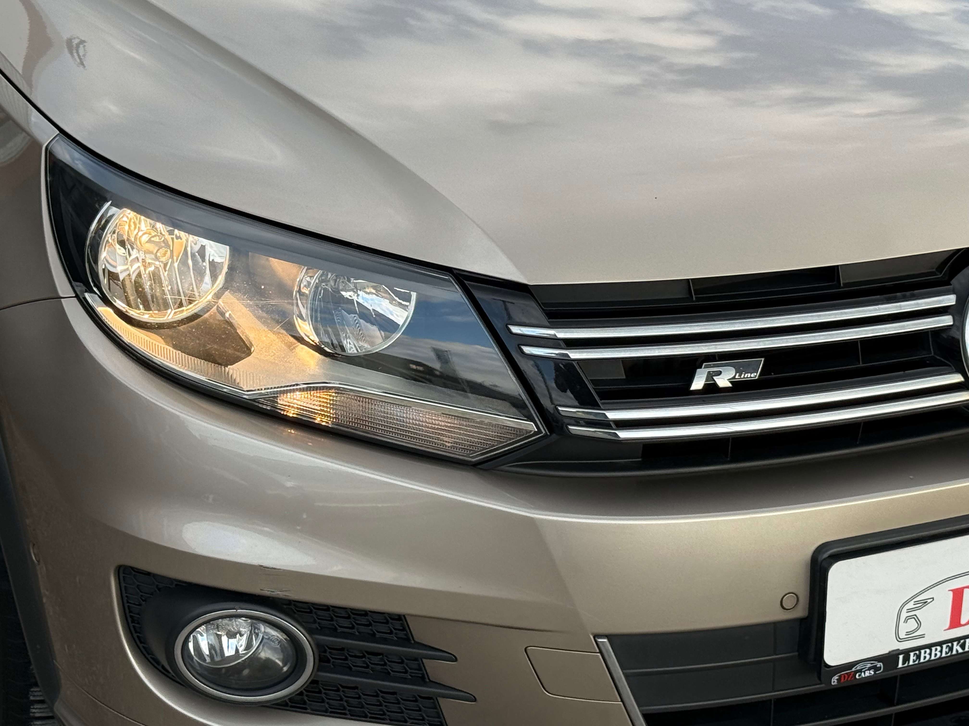 Volkswagen Tiguan R-LINE 1.4TSI 150PK DSG |✅NAVIGATIE | PANO DAK | LEDER | BLUETOOTH | TREKHAAK | ZETELVERWARMING |