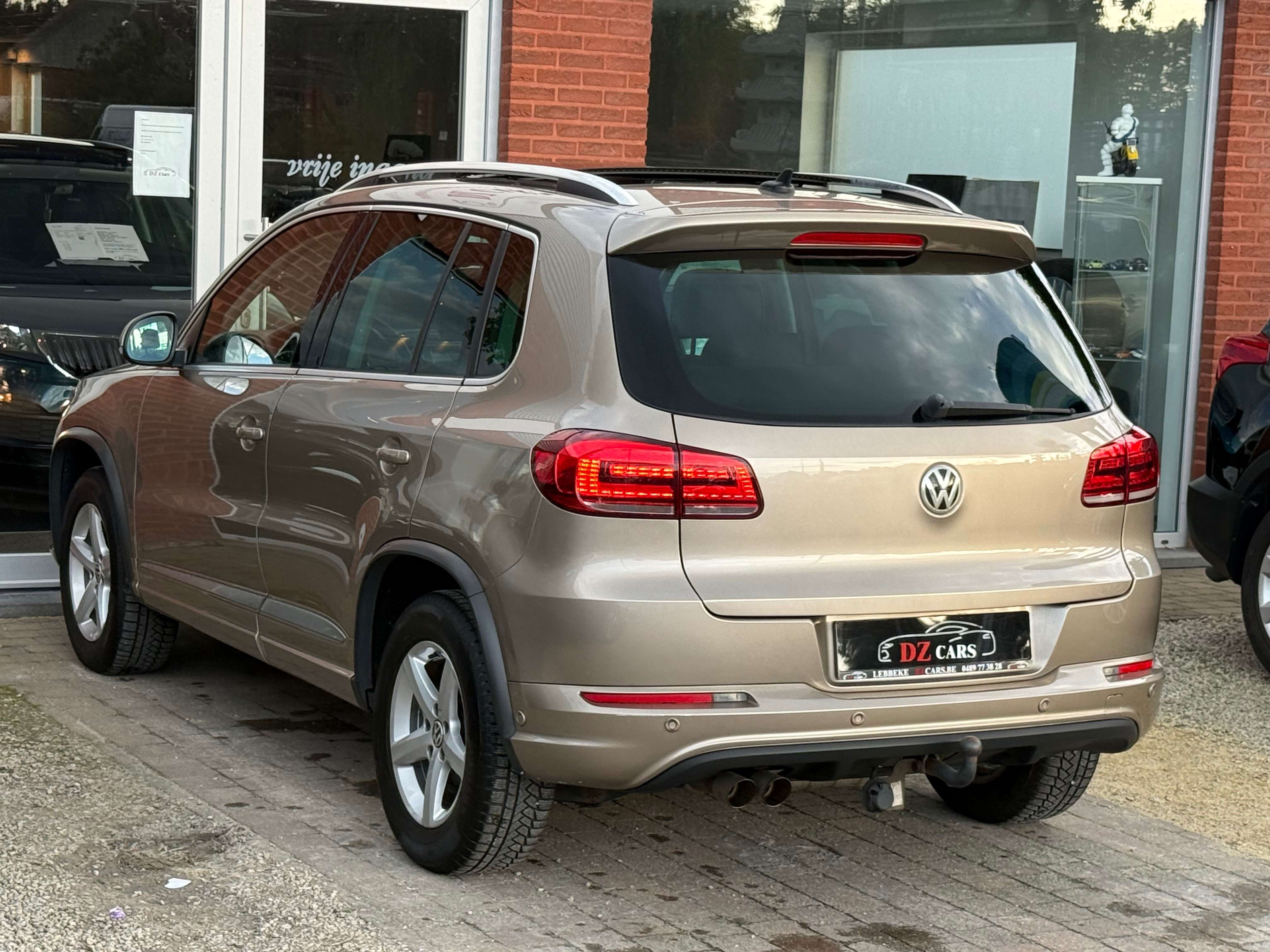 Volkswagen Tiguan R-LINE 1.4TSI 150PK DSG |✅NAVIGATIE | PANO DAK | LEDER | BLUETOOTH | TREKHAAK | ZETELVERWARMING |