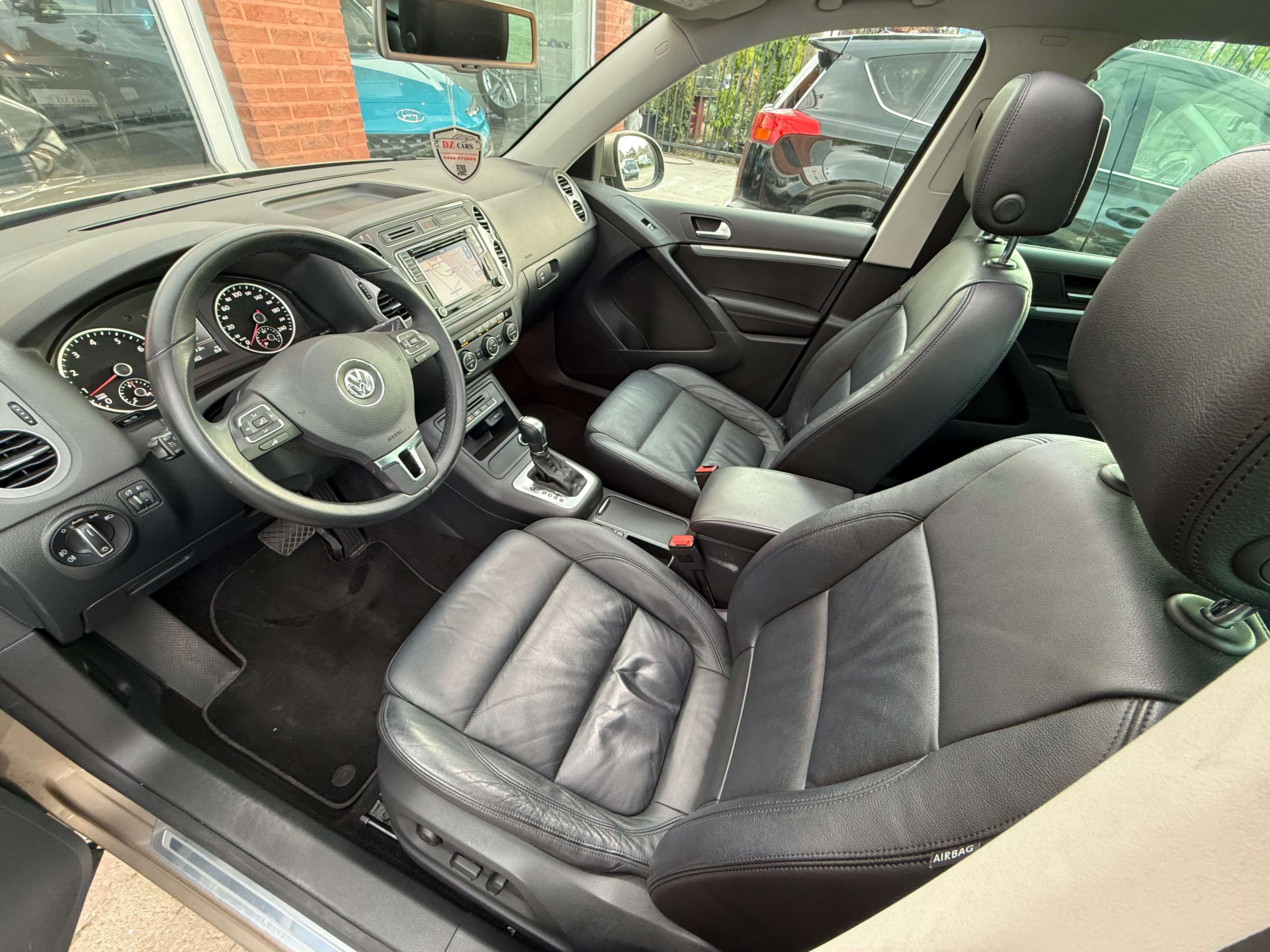 Volkswagen Tiguan R-LINE 1.4TSI 150PK DSG |✅NAVIGATIE | PANO DAK | LEDER | BLUETOOTH | TREKHAAK | ZETELVERWARMING |