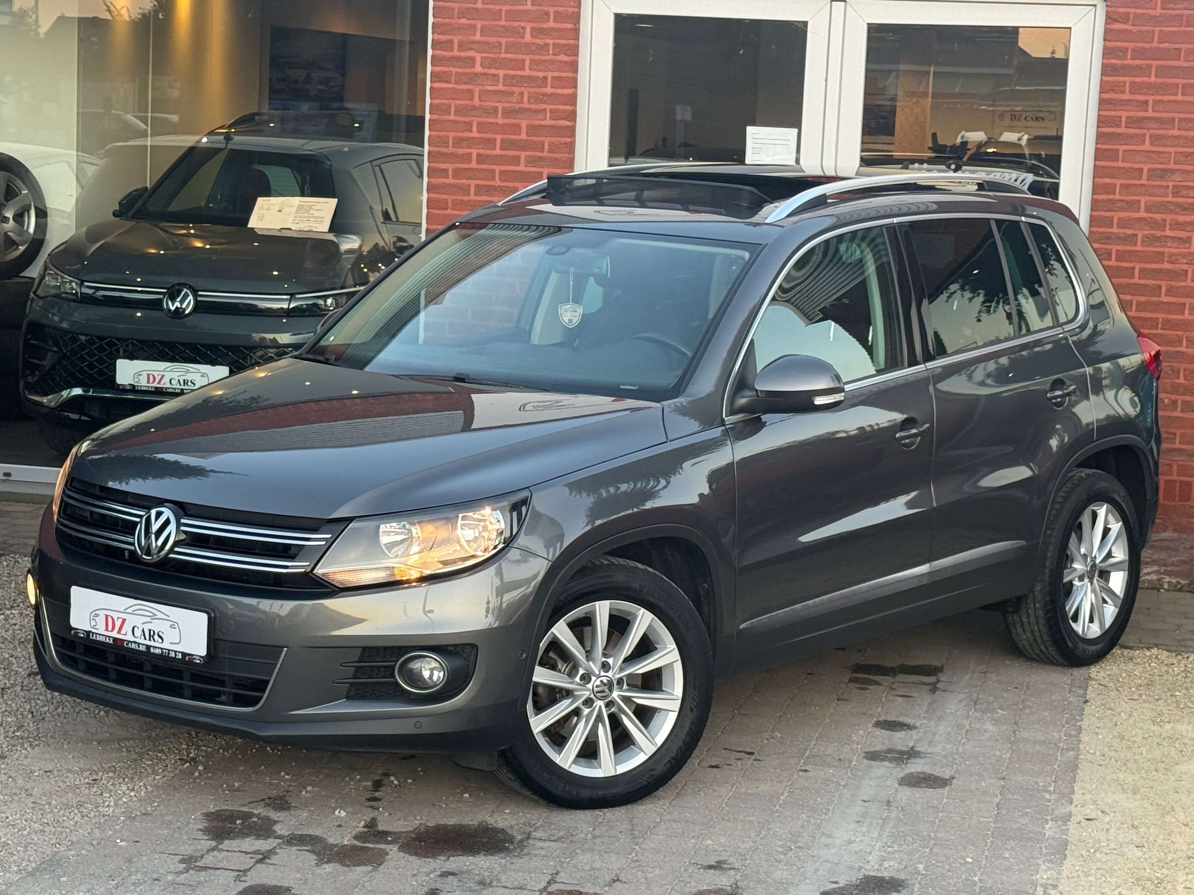 Volkswagen Tiguan 2.0TDI 110PK |✅NAVIGATIE | PANO DAK | LEDER | TREKHAAK | ZETELVERWARMING | EURO 6B | ELEK. ZETEL VERSTELLING