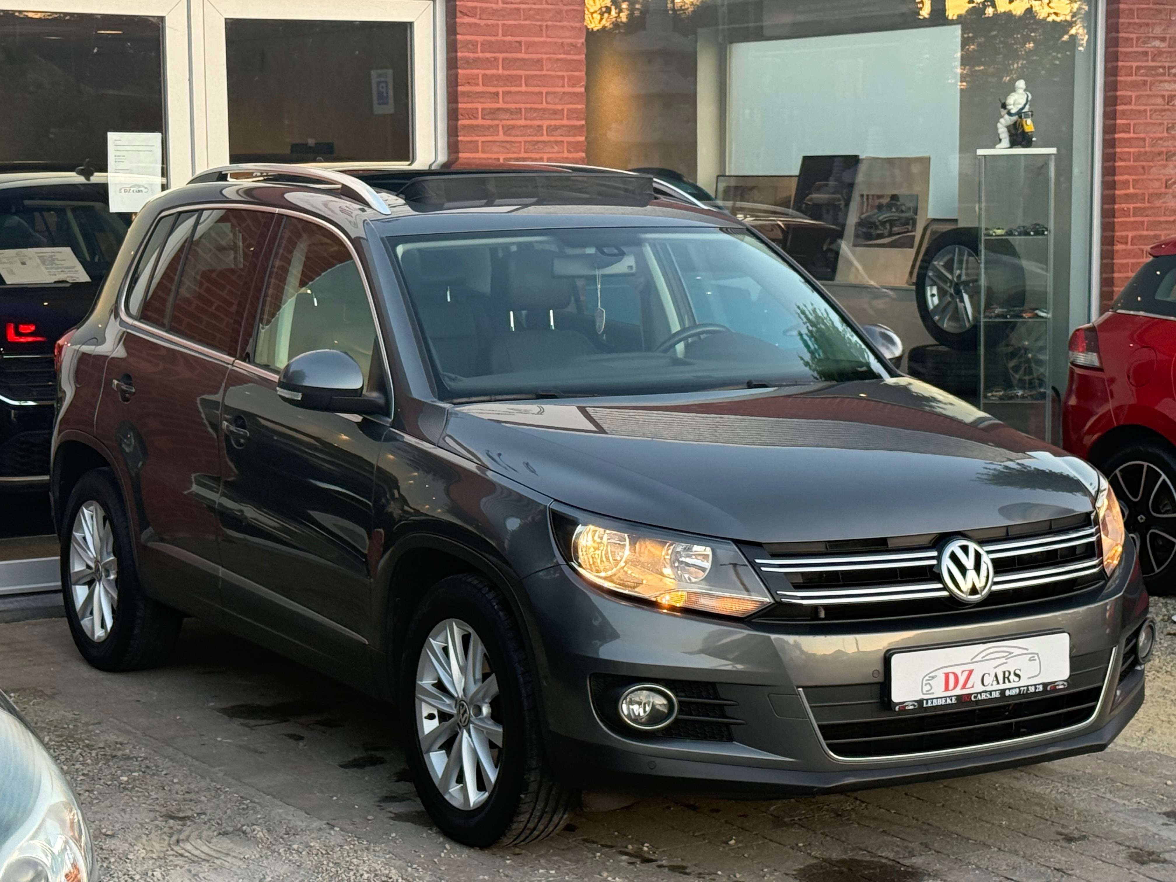 Volkswagen Tiguan 2.0TDI 110PK |✅NAVIGATIE | PANO DAK | LEDER | TREKHAAK | ZETELVERWARMING | EURO 6B | ELEK. ZETEL VERSTELLING