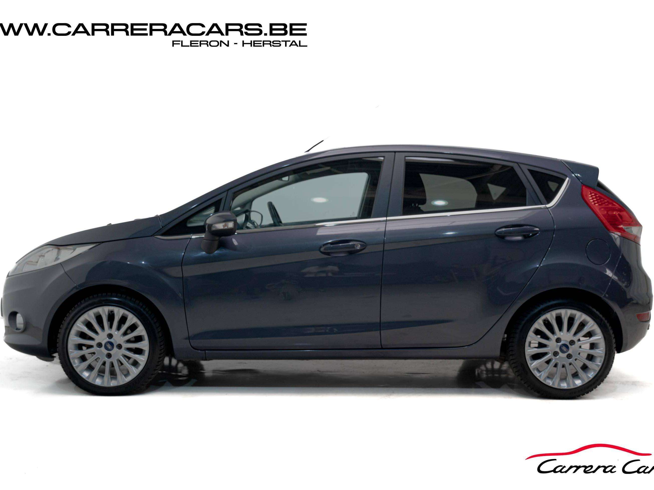 Ford Fiesta 1.4i Titanium **CLIM**CAPTEUR**JANTES ALUS**BOITE AUTO**